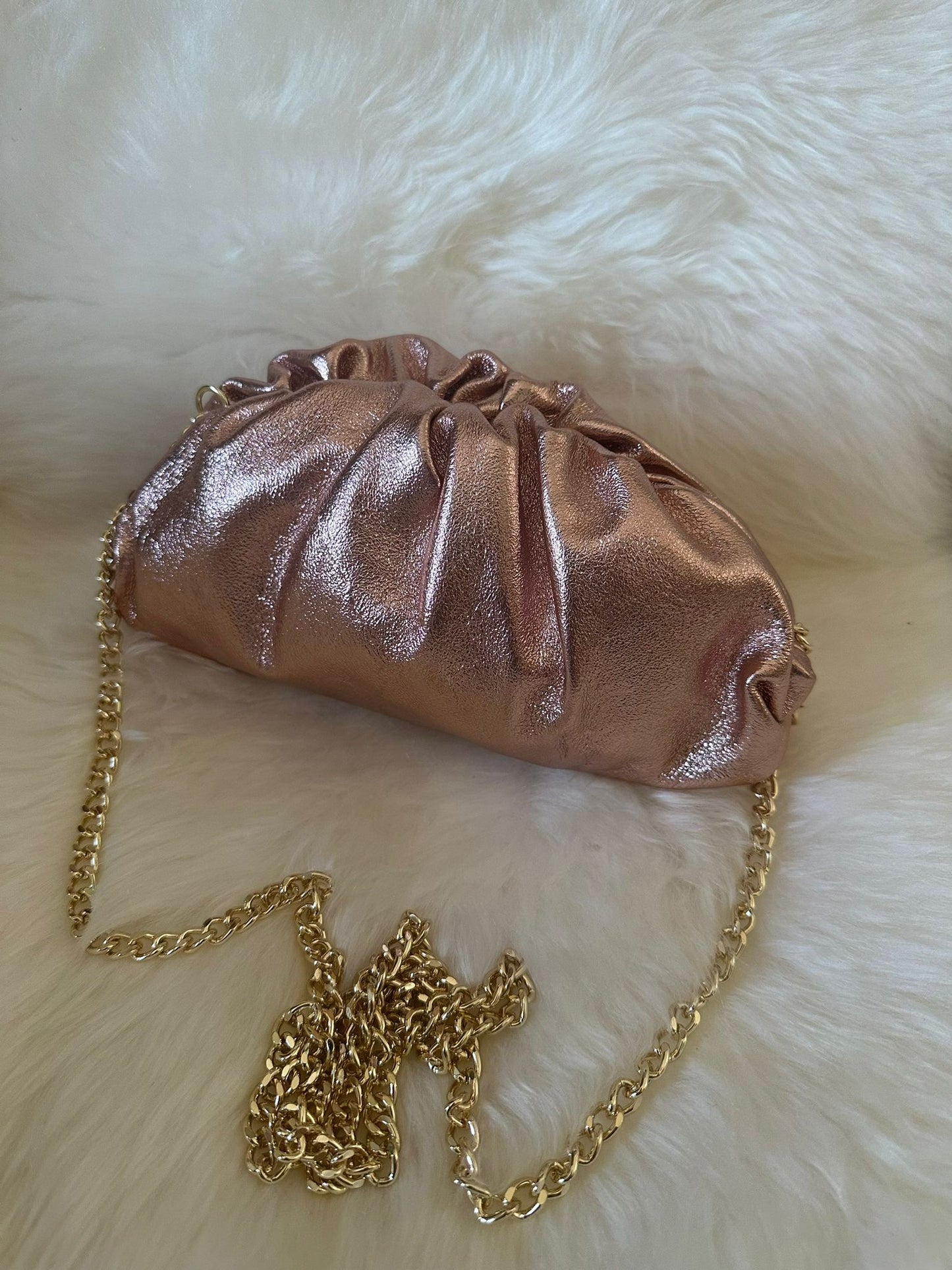 Laminated clutch bag in real leather