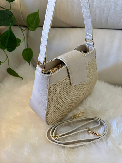 Shoulder bag with leather and raffia shoulder strap