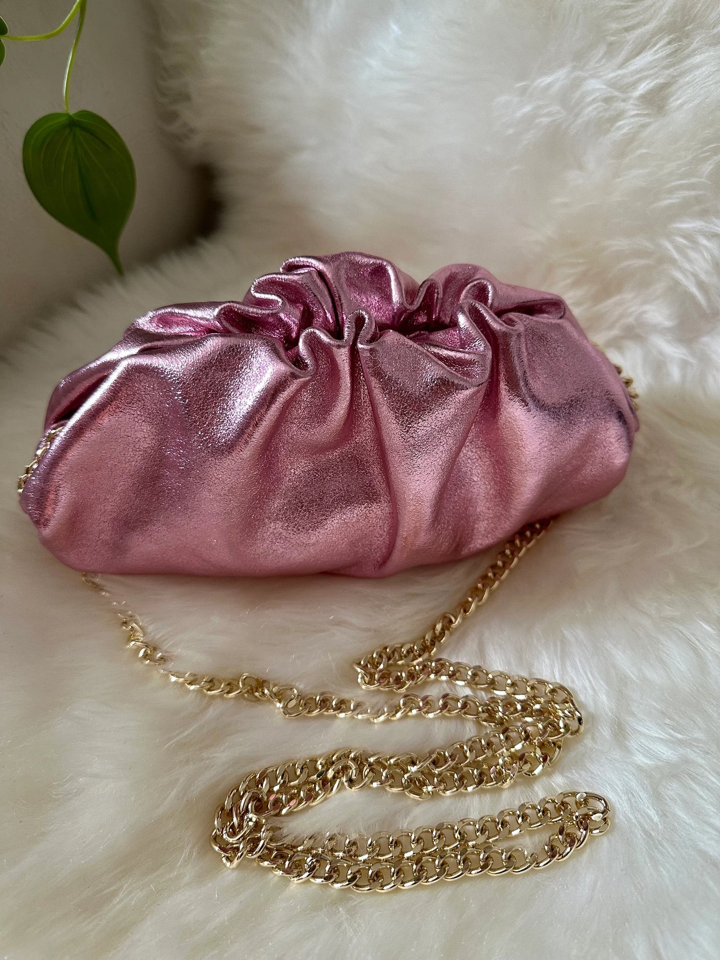 Laminated clutch bag in real leather